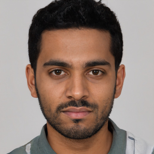 Neutral latino young-adult male with short  black hair and brown eyes