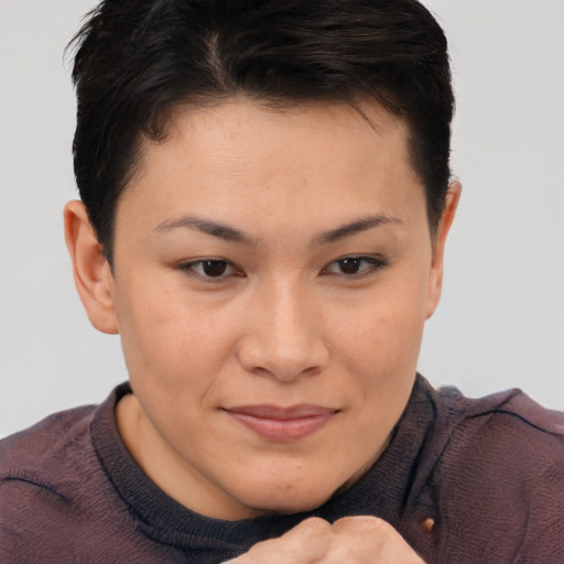 Joyful asian young-adult female with short  brown hair and brown eyes