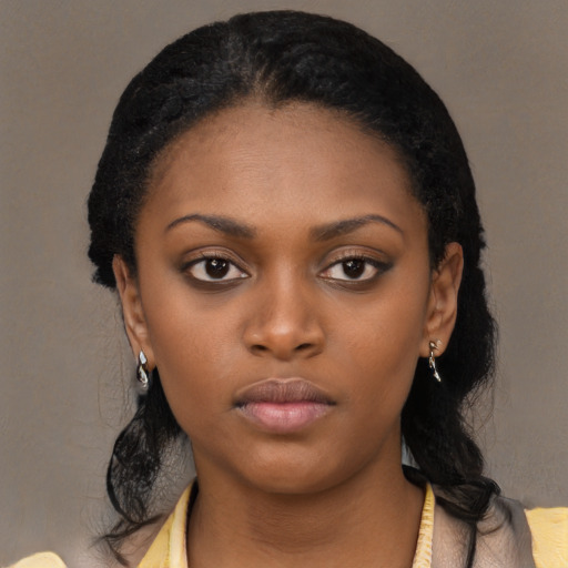 Neutral black young-adult female with medium  black hair and brown eyes