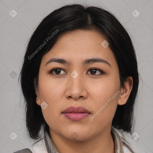 Joyful asian young-adult female with medium  black hair and brown eyes