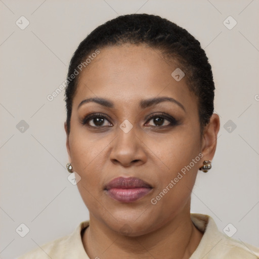 Joyful latino young-adult female with short  black hair and brown eyes