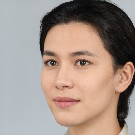 Joyful white young-adult female with medium  brown hair and brown eyes