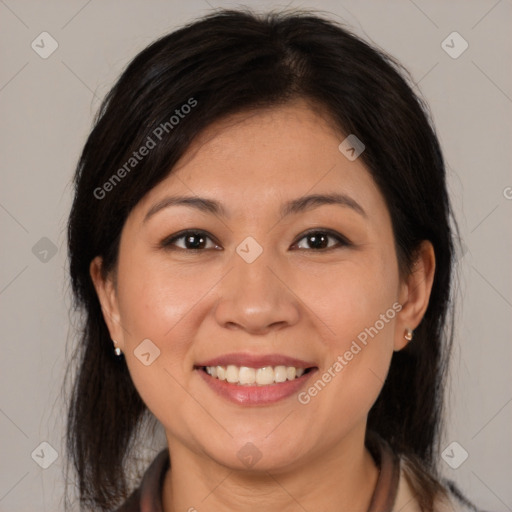 Joyful white young-adult female with medium  brown hair and brown eyes