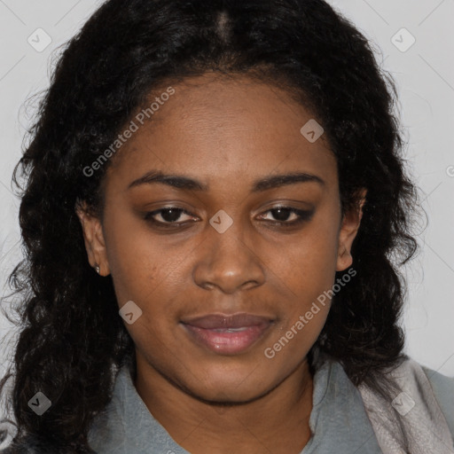 Joyful black young-adult female with long  black hair and brown eyes