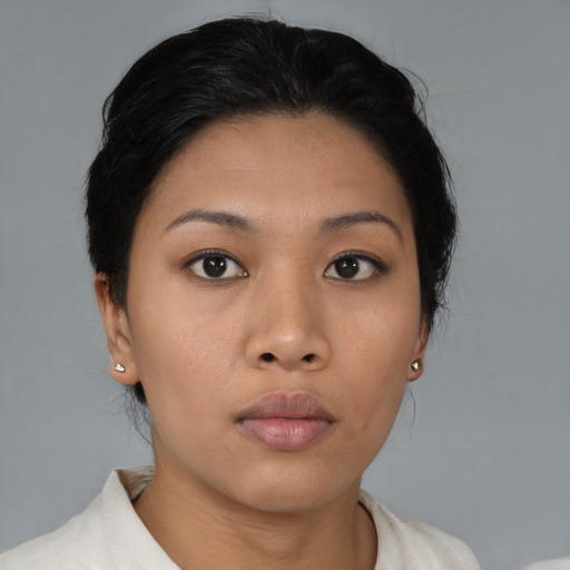 Neutral asian young-adult female with short  brown hair and brown eyes