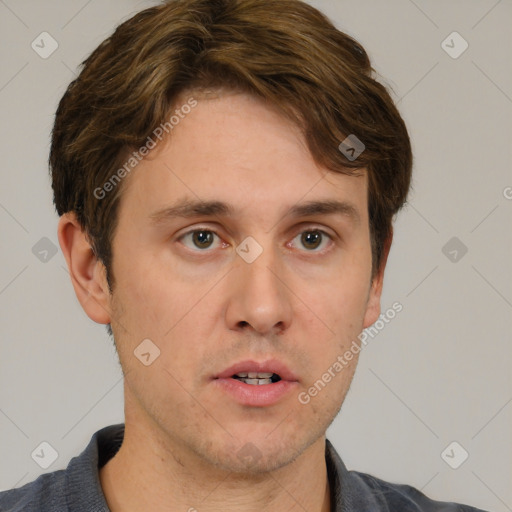 Neutral white young-adult male with short  brown hair and brown eyes