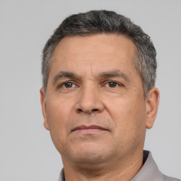 Neutral white adult male with short  black hair and brown eyes