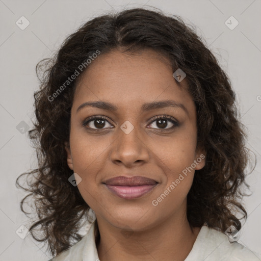 Joyful black young-adult female with medium  brown hair and brown eyes