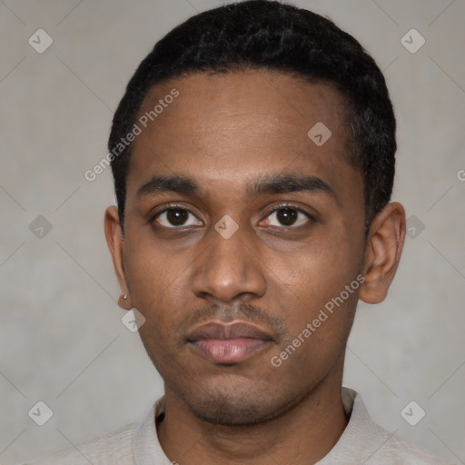 Neutral latino young-adult male with short  black hair and brown eyes