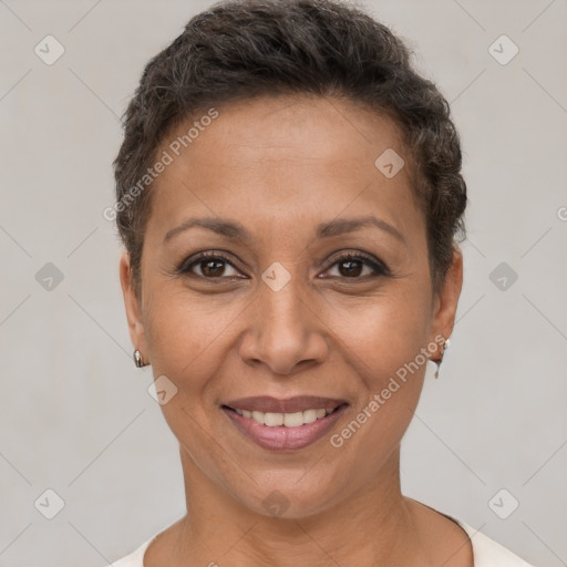 Joyful white adult female with short  brown hair and brown eyes