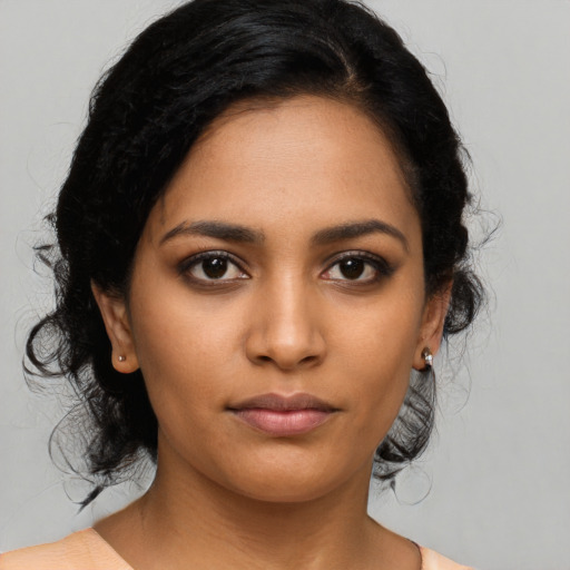 Neutral latino young-adult female with medium  black hair and brown eyes