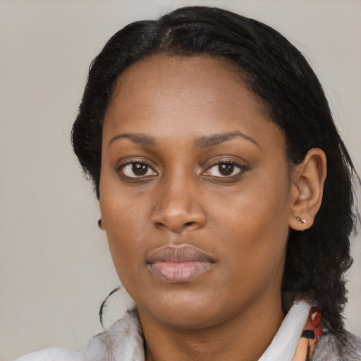 Neutral black young-adult female with medium  black hair and brown eyes