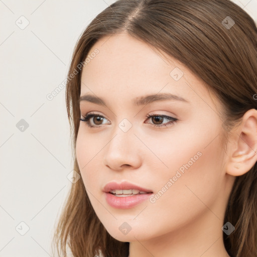 Neutral white young-adult female with long  brown hair and brown eyes