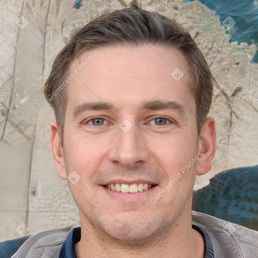 Joyful white adult male with short  brown hair and brown eyes