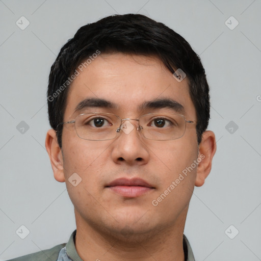 Neutral white young-adult male with short  black hair and brown eyes
