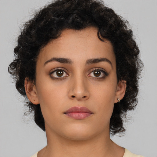 Neutral latino young-adult female with long  brown hair and brown eyes