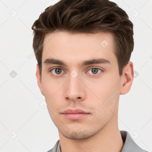 Neutral white young-adult male with short  brown hair and brown eyes