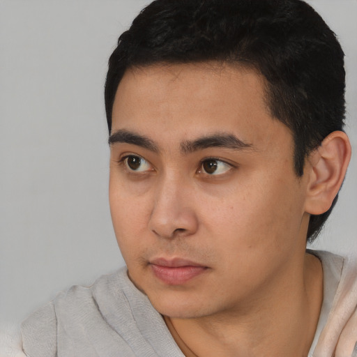 Neutral asian young-adult male with short  black hair and brown eyes