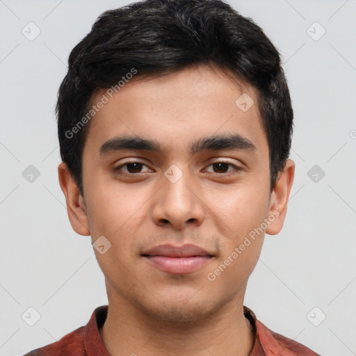 Joyful asian young-adult male with short  black hair and brown eyes