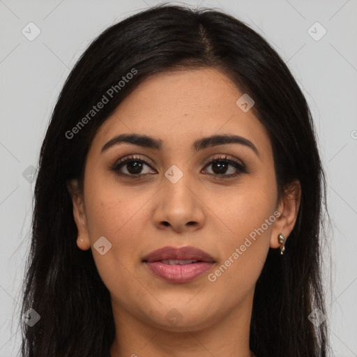 Joyful latino young-adult female with long  brown hair and brown eyes