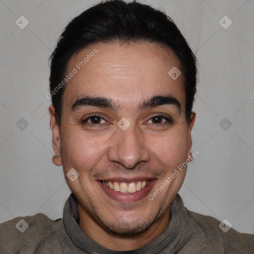 Joyful white young-adult male with short  black hair and brown eyes