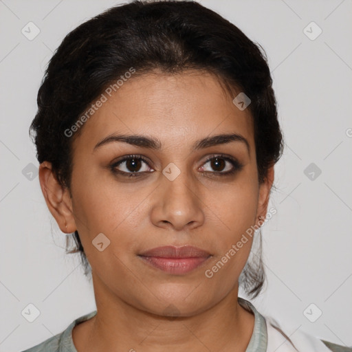 Joyful latino young-adult female with short  brown hair and brown eyes