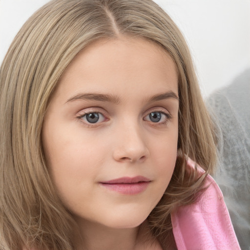 Joyful white child female with long  brown hair and grey eyes