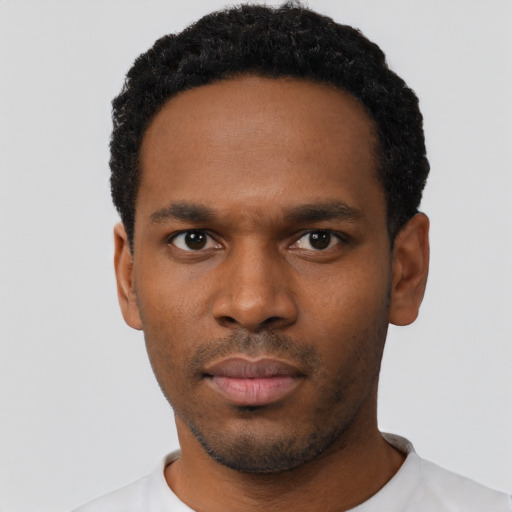 Neutral black young-adult male with short  black hair and brown eyes
