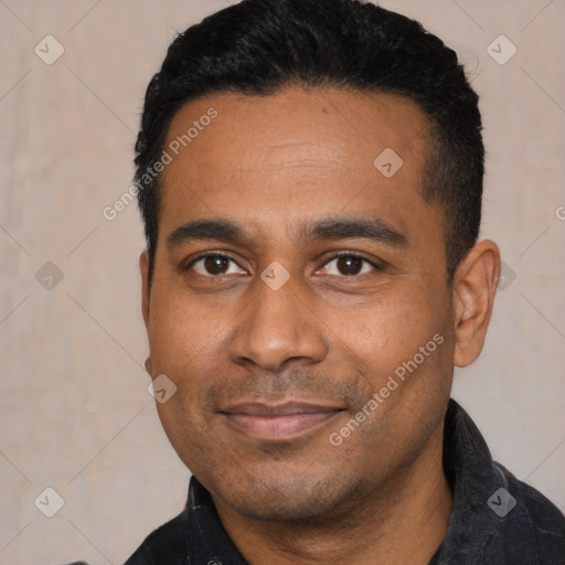 Joyful latino young-adult male with short  black hair and brown eyes