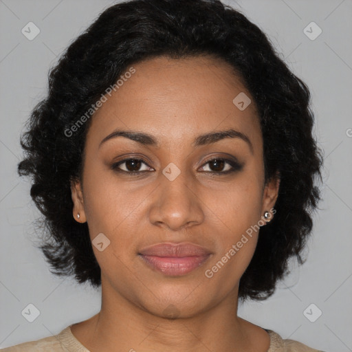 Joyful black young-adult female with medium  brown hair and brown eyes