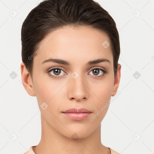 Neutral white young-adult female with short  brown hair and brown eyes