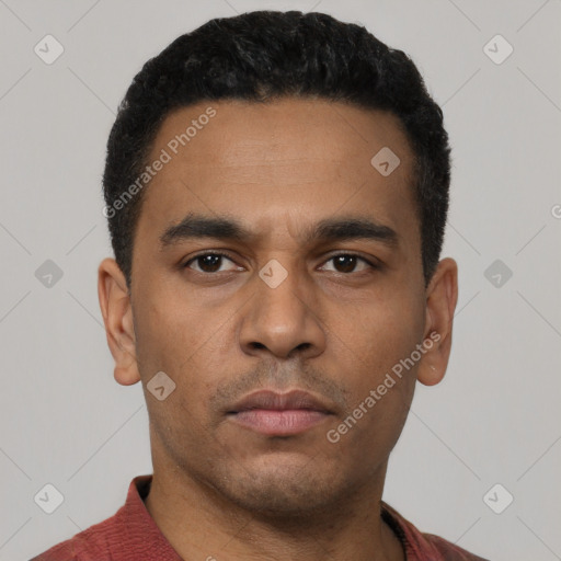 Neutral latino young-adult male with short  black hair and brown eyes