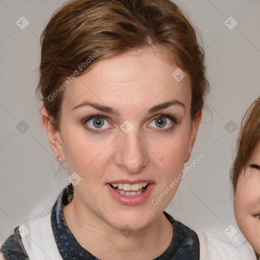 Joyful white young-adult female with medium  brown hair and blue eyes