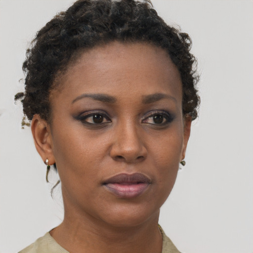 Neutral black young-adult female with short  brown hair and brown eyes