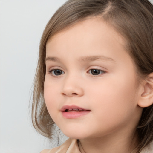 Neutral white child female with medium  brown hair and brown eyes