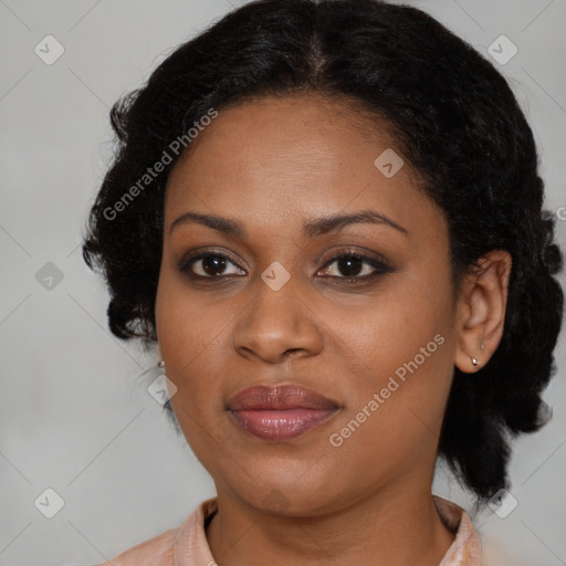 Joyful black young-adult female with medium  brown hair and brown eyes