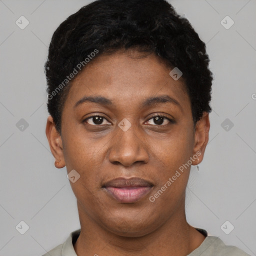 Joyful black young-adult female with short  black hair and brown eyes