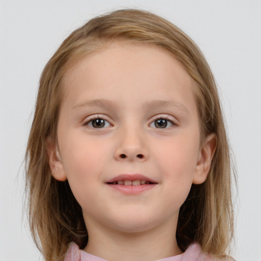 Joyful white child female with medium  brown hair and brown eyes