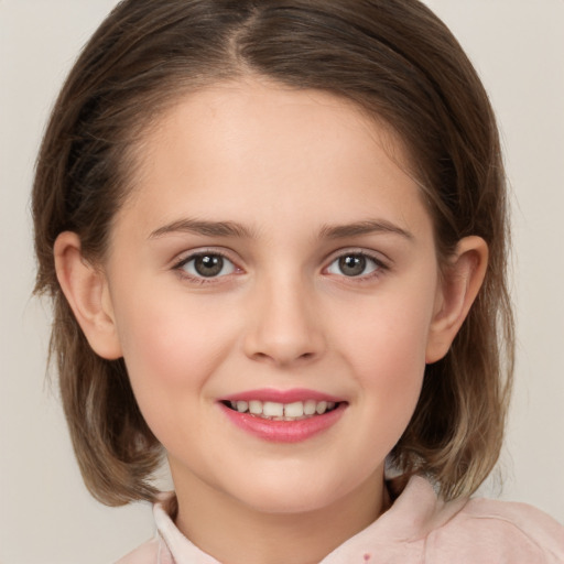 Joyful white child female with medium  brown hair and brown eyes