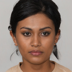 Neutral asian young-adult female with medium  brown hair and brown eyes