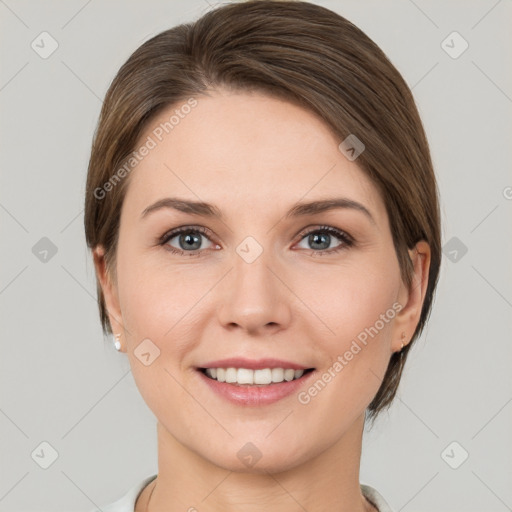 Joyful white young-adult female with short  brown hair and grey eyes