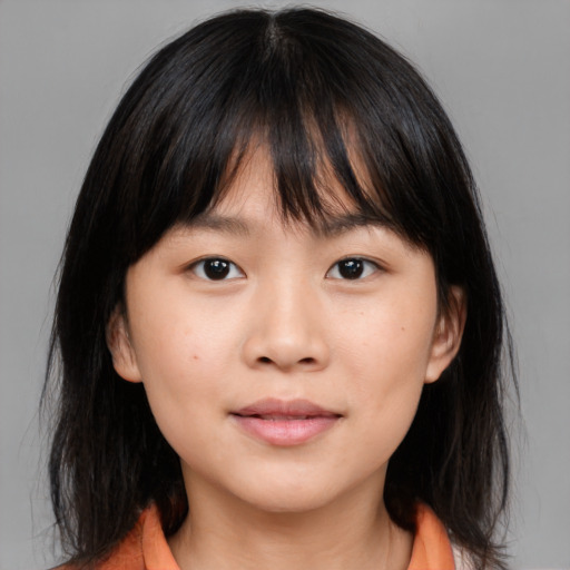 Neutral asian young-adult female with medium  brown hair and brown eyes