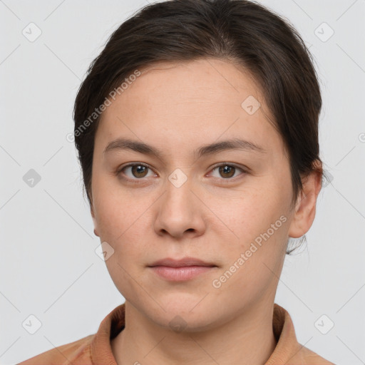 Neutral white young-adult female with short  brown hair and brown eyes