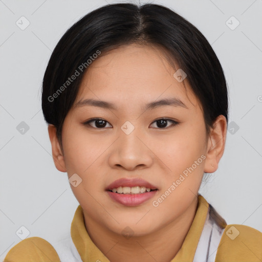 Joyful asian young-adult female with short  brown hair and brown eyes