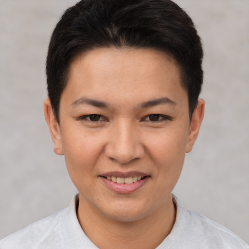 Joyful white young-adult female with short  brown hair and brown eyes