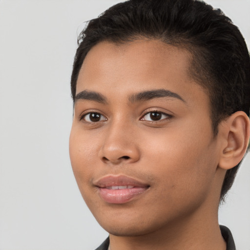 Joyful latino young-adult female with short  black hair and brown eyes