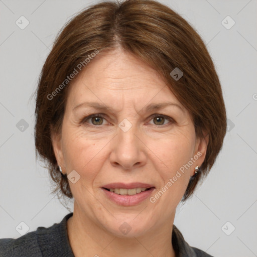 Joyful white adult female with medium  brown hair and grey eyes