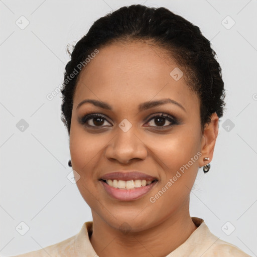 Joyful latino young-adult female with long  black hair and brown eyes