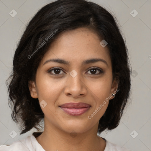 Joyful latino young-adult female with medium  brown hair and brown eyes