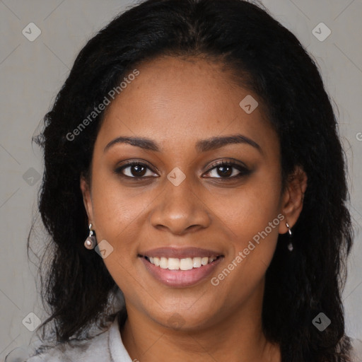 Joyful black young-adult female with long  black hair and brown eyes